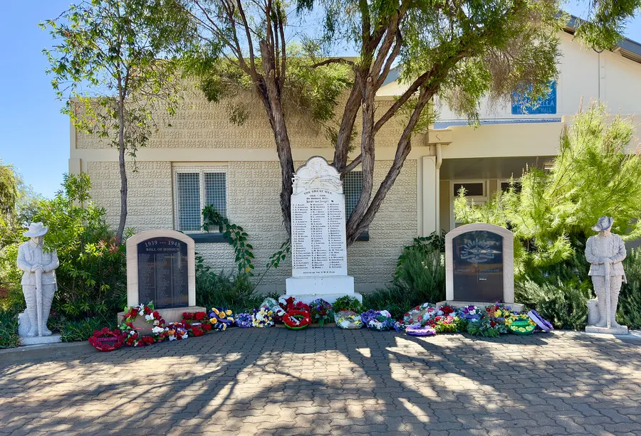 Wreaths at the war memorial in Augathella, Queensland, on Anzac Day 2024.