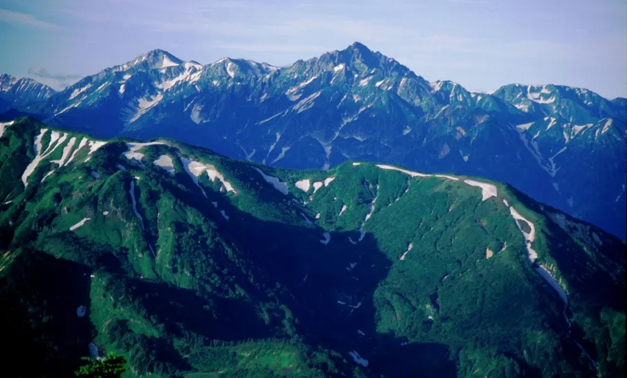 Mount Tate and Mount Tsurugi in the Northern Alps of Japan, seen from Mount Asahi in summer