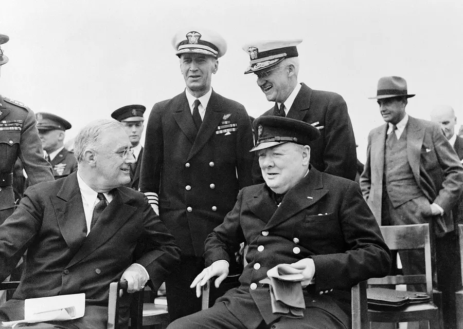 Franklin D. Roosevelt and Winston Churchill at a Sunday service on the quarterdeck of HMS Prince of Wales in Placentia Bay, 10 August 1941