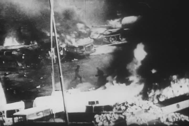 Burning barricades and Soviet tanks in Czechoslovakia on 21 August 1968, in a photograph held by the US National Archives