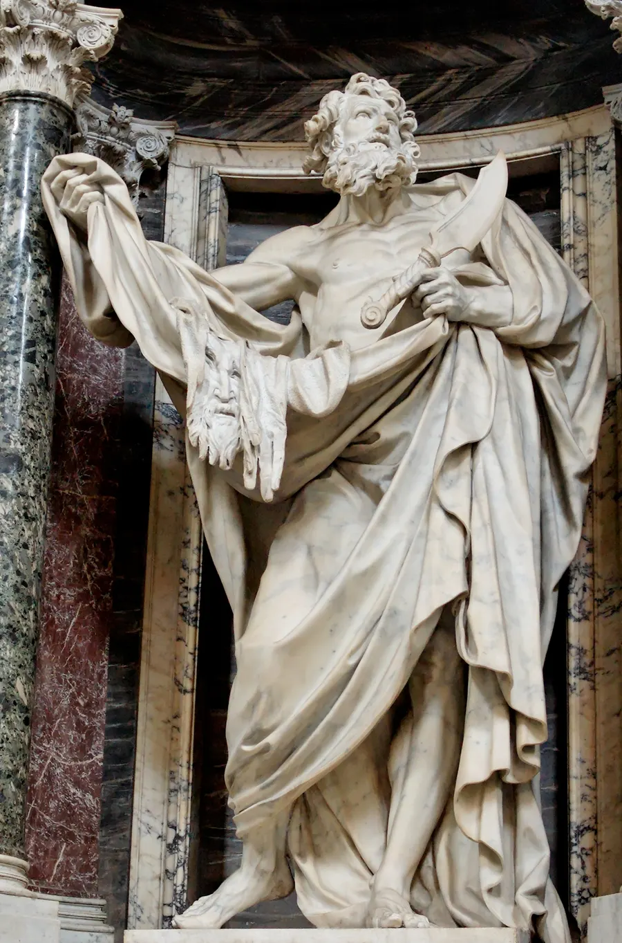 Statue of St Bartholomew holding his flayed skin, in the Archbasilica of St John Lateran in Rome