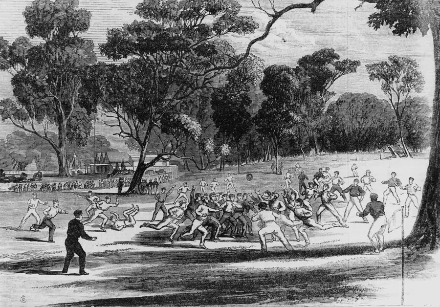 Football at the Richmond Paddock beside the Melbourne Cricket Ground, in a wood engraving by Robert Bruce from about 1866