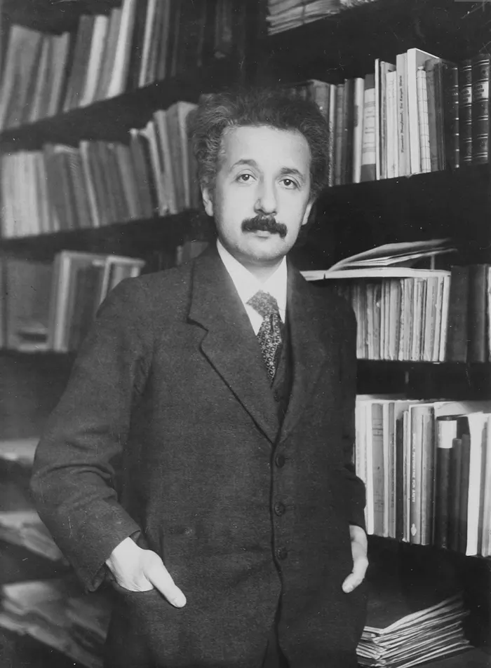 Albert Einstein in Paul Ehrenfest's library in Leiden, 1916.