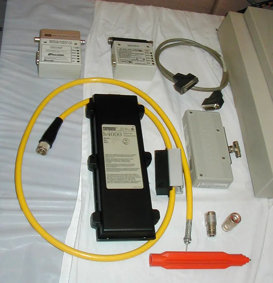 Early 10BASE5 'thick' Ethernet transceivers and cable.