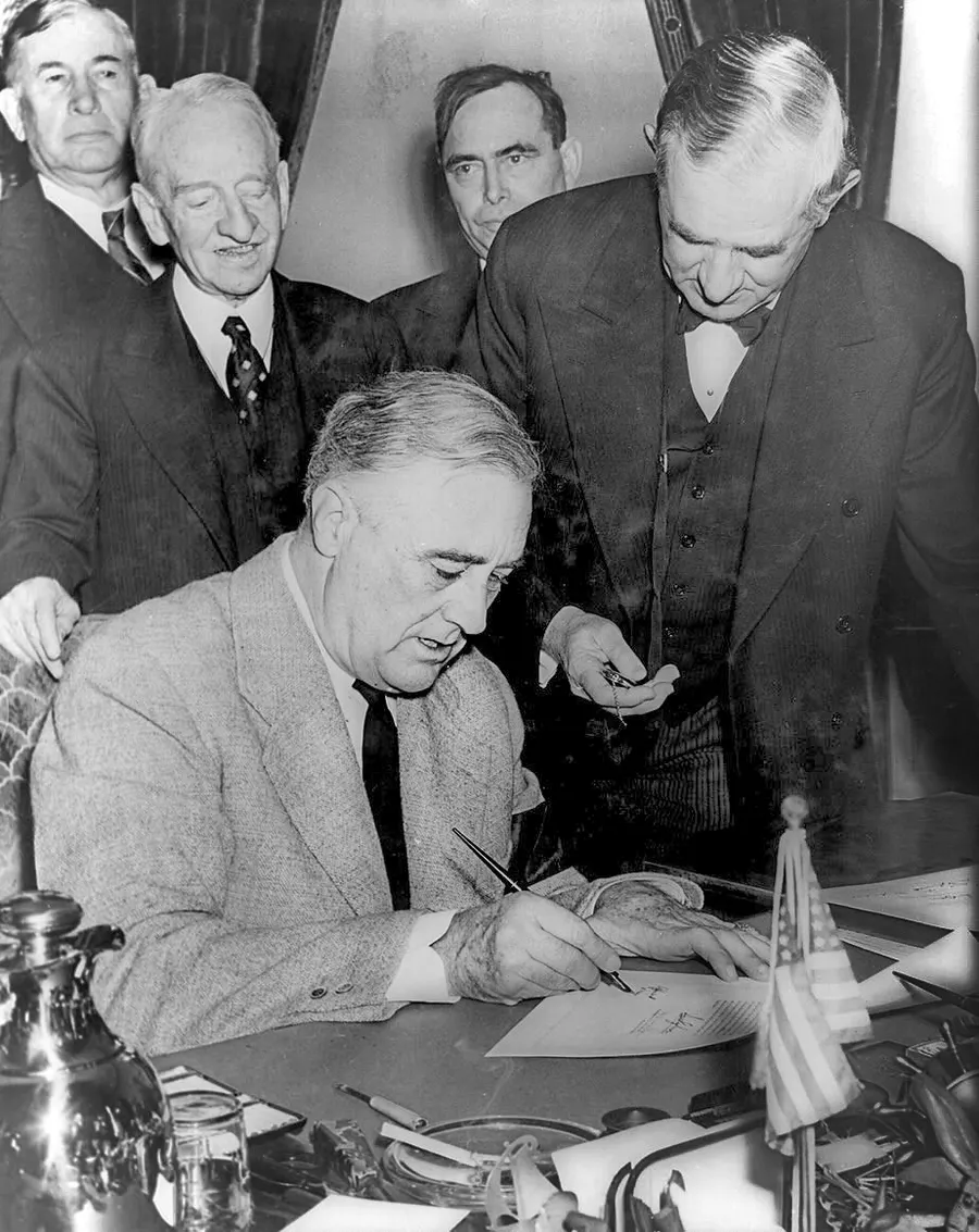 President Franklin Roosevelt signing the declaration of war against Germany on 11 December 1941.