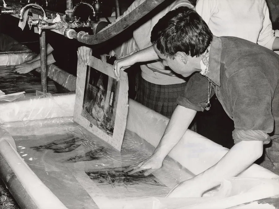 Manuscripts from the National Library being washed after the flood, 1966.