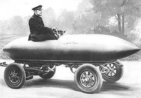 Camille Jenatzy at the tiller of La Jamais Contente, the bullet-shaped electric car.