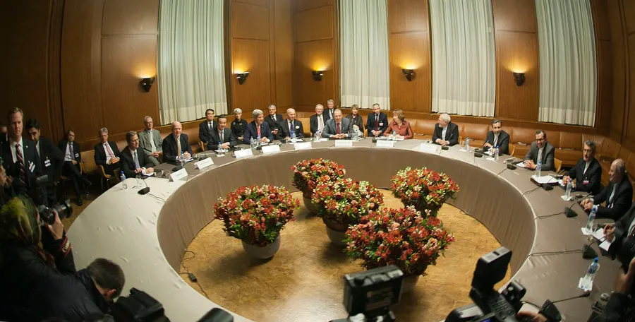 Foreign ministers of the six powers, the European Union and Iran meeting in Geneva in the early hours of 24 November 2013.