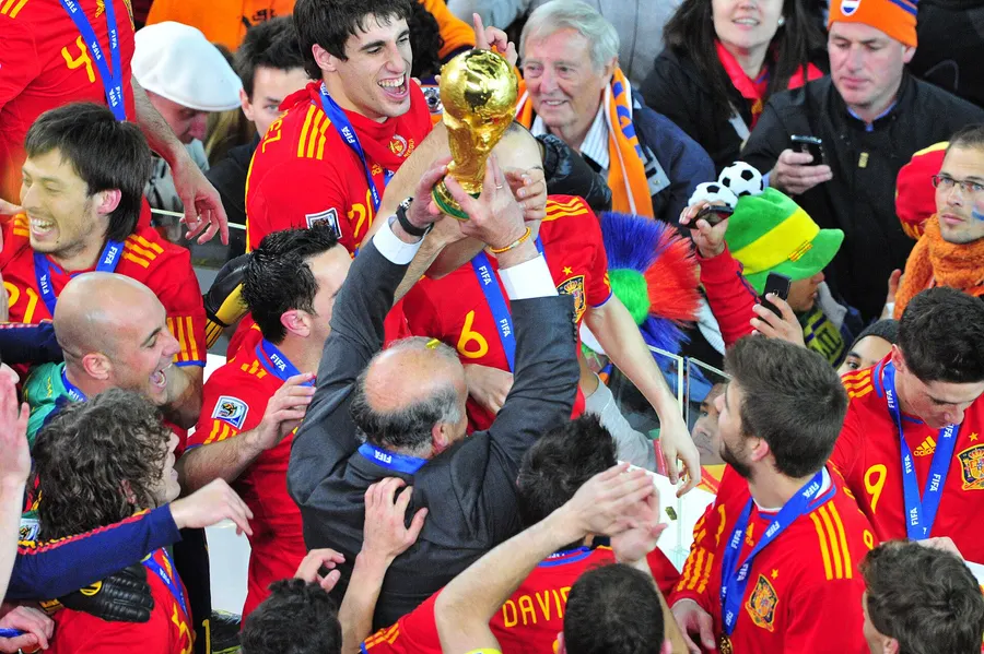 The World Cup trophy held aloft amid Spain's celebrations in July 2010