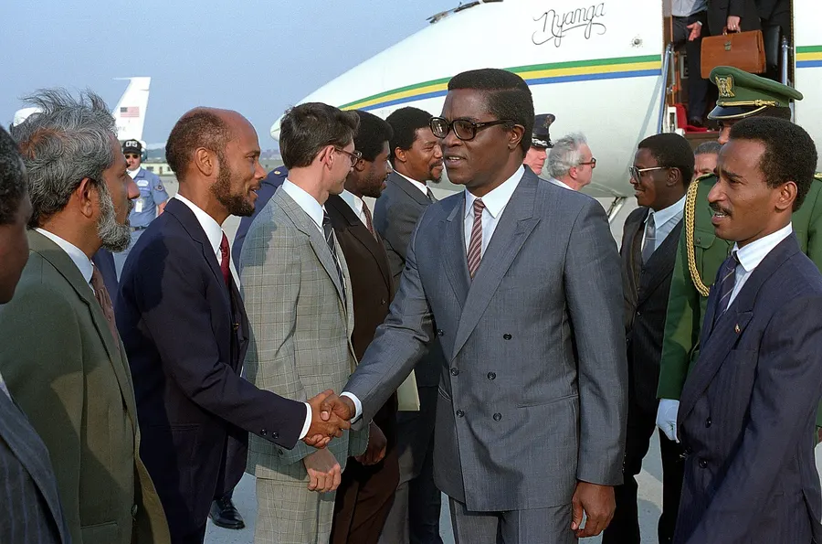 Manuel Pinto da Costa, the country's first president, greeted by a US State Department delegation at Andrews Air Force Base in 1986