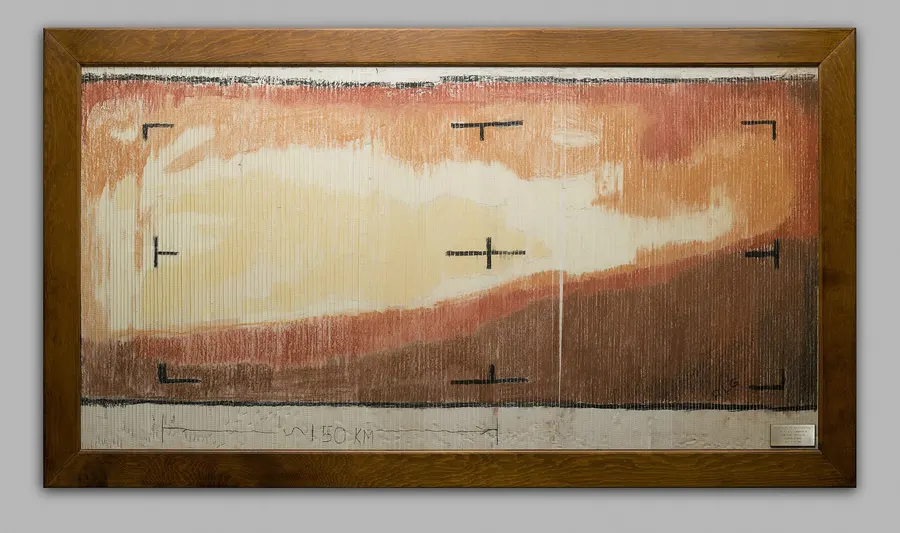 The first image of Mars from Mariner 4, coloured in by hand by JPL engineers from printed strips of data in July 1965, now framed