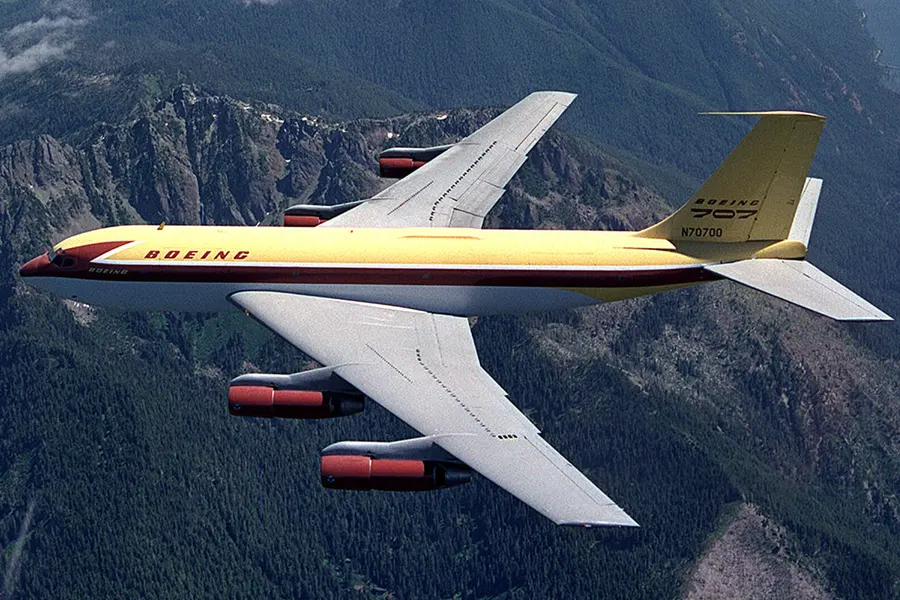 The Boeing 367-80, the 'Dash 80', in flight in its brown and yellow paint
