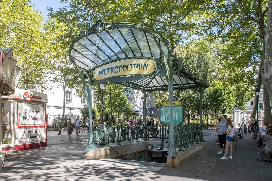 One of Hector Guimard's glass-roofed Art Nouveau Métro entrances, at Abbesses in Montmartre