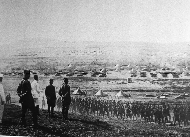 General Henri Gouraud and his officers watch French troops at Maysalun in July 1920