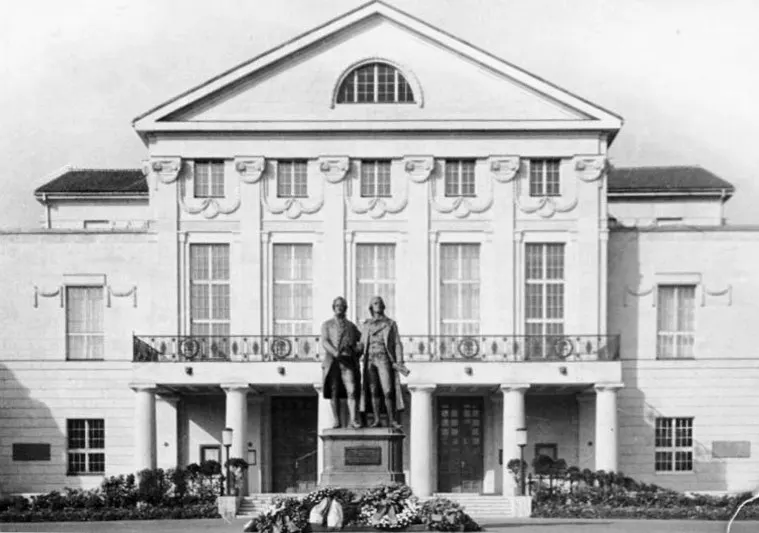 The German National Theatre in Weimar, where the National Assembly met in 1919, with the Goethe and Schiller monument in front, photographed in 1952