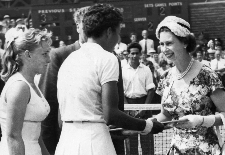 Queen Elizabeth II congratulates Althea Gibson on her Wimbledon title in 1957