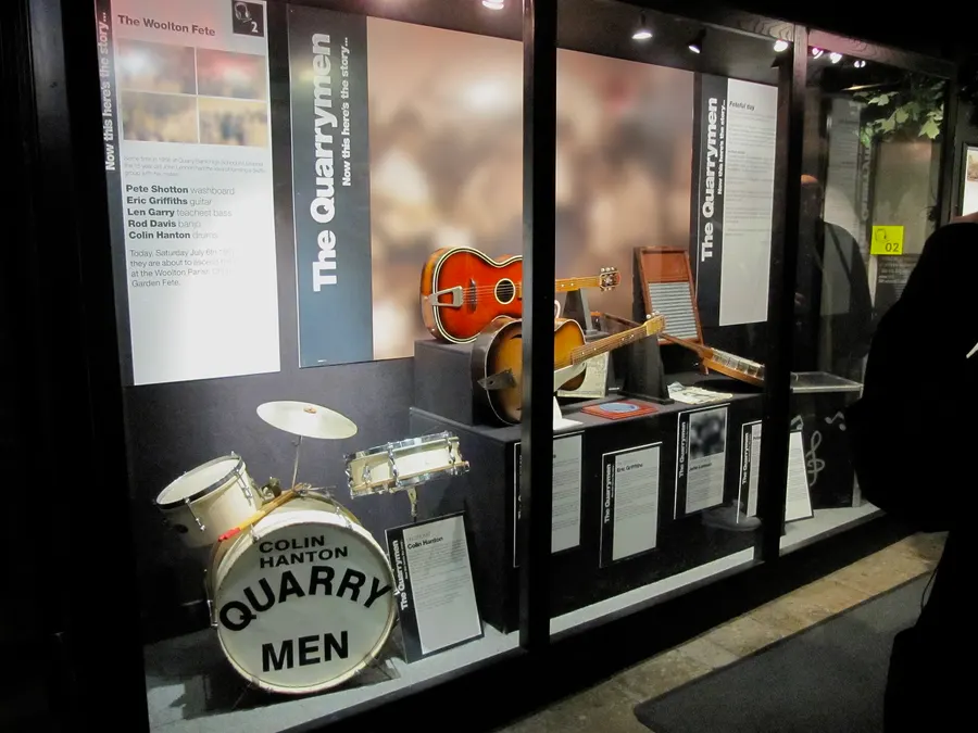 A Quarry Men bass drum and guitars on display at The Beatles Story museum in Liverpool