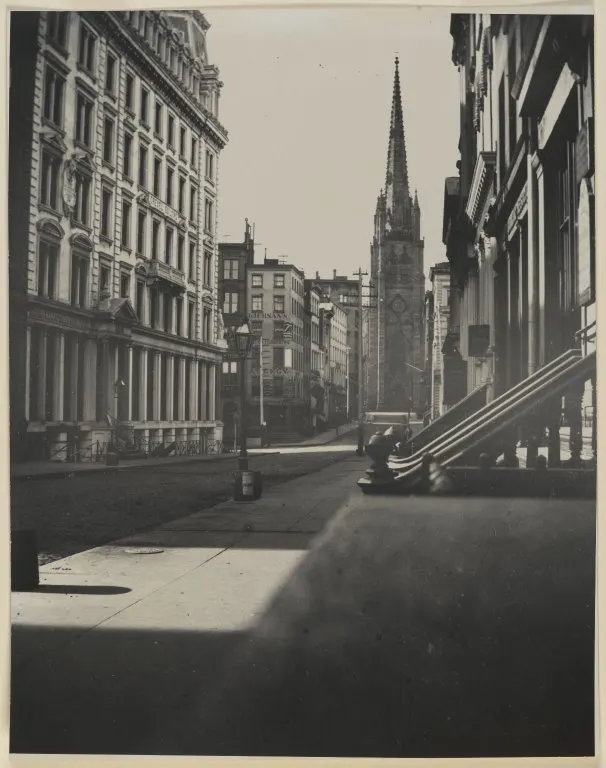 Wall Street in Manhattan, looking towards Trinity Church, photographed by George Bradford Brainerd in the 1870s or 1880s