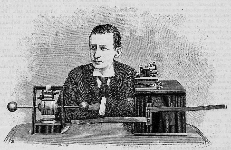 A young Guglielmo Marconi with his early wireless transmitter and receiver, in an engraving of the 1890s