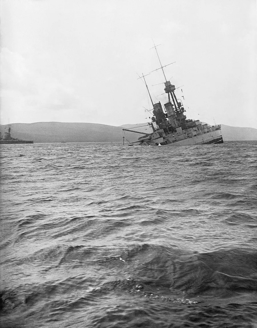 The German battleship SMS Bayern going down by the stern in Scapa Flow, photographed by a Royal Navy photographer