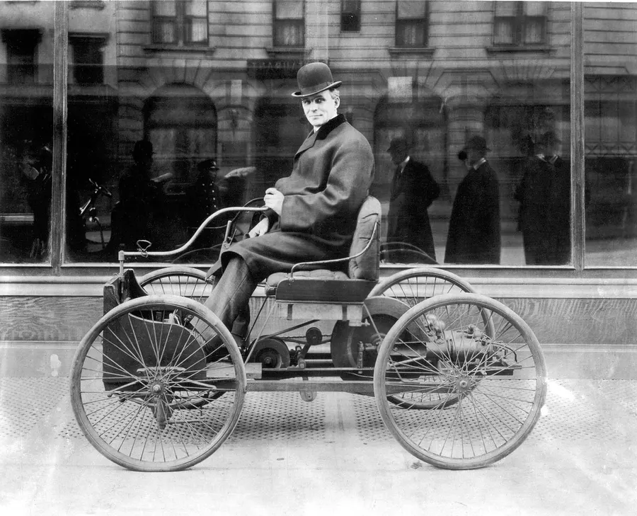Henry Ford seated in his 1896 Quadricycle, photographed some years later
