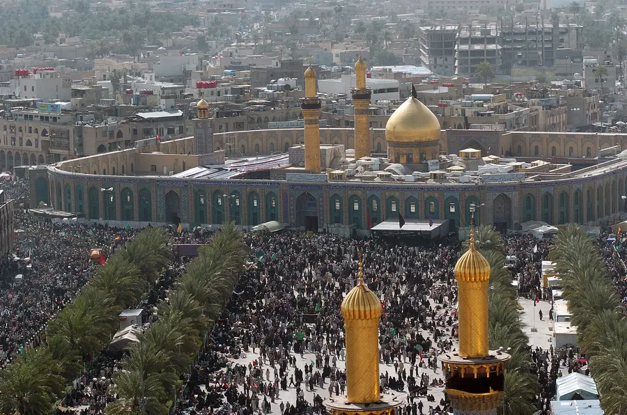 Pilgrims gathered around the Husayn Mosque in Karbala during Arba'een, photographed in 2005.