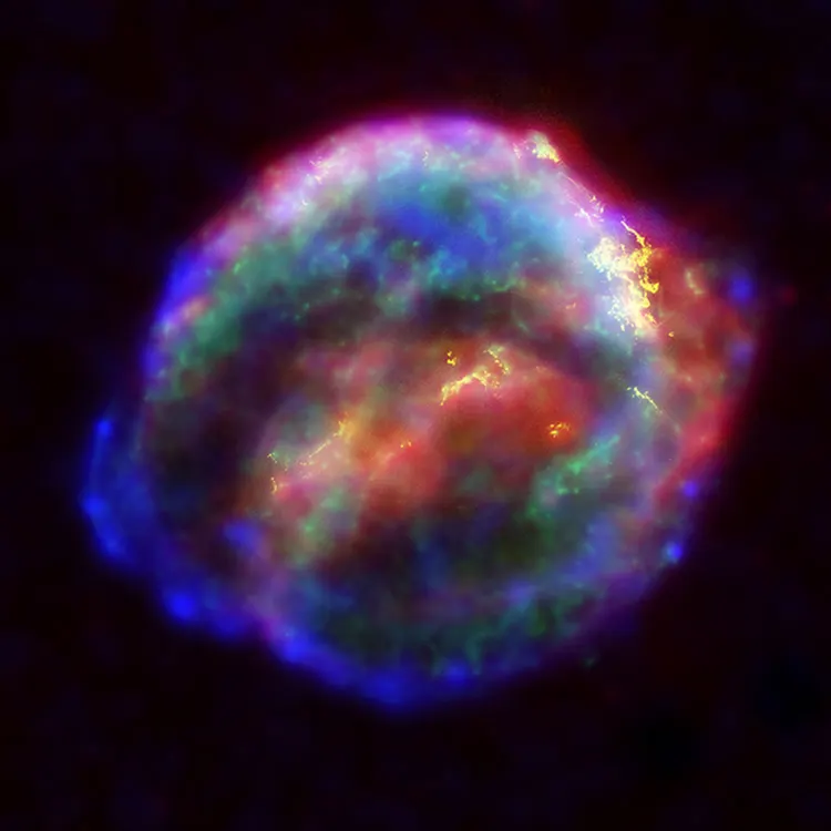 The remnant of the 1604 supernova, a composite of X-ray, optical and infrared images from the Chandra, Hubble and Spitzer observatories.