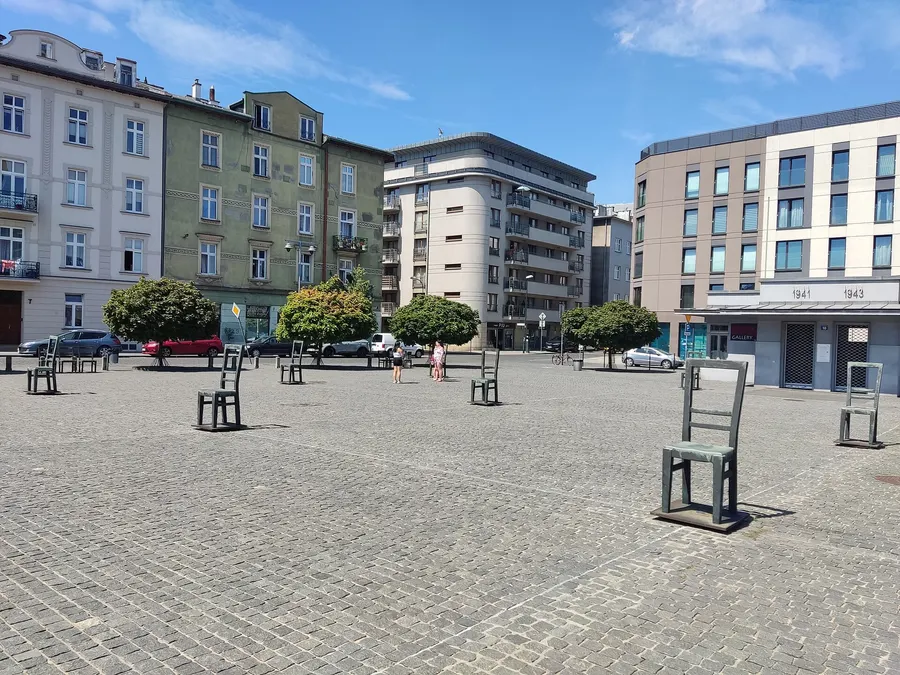 The memorial of empty chairs on Ghetto Heroes Square in Kraków, 2024.