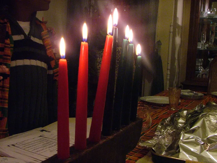 A kinara with its red, black and green candles.