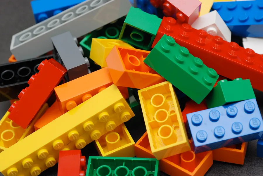 A pile of Lego bricks, which still fit bricks made under the 1958 patent.