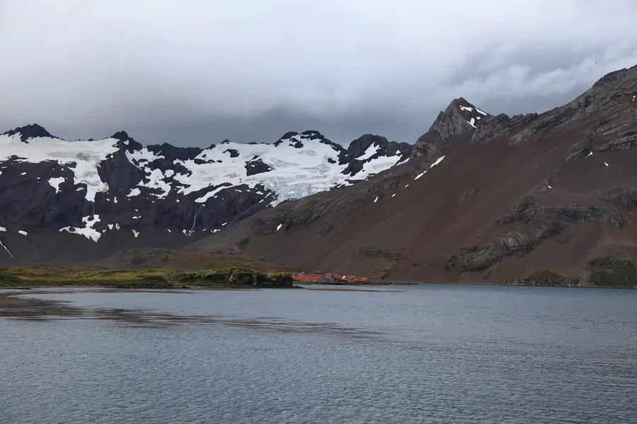 Leith Harbour on South Georgia in 2011, with the ruins of its whaling station at the water's edge.