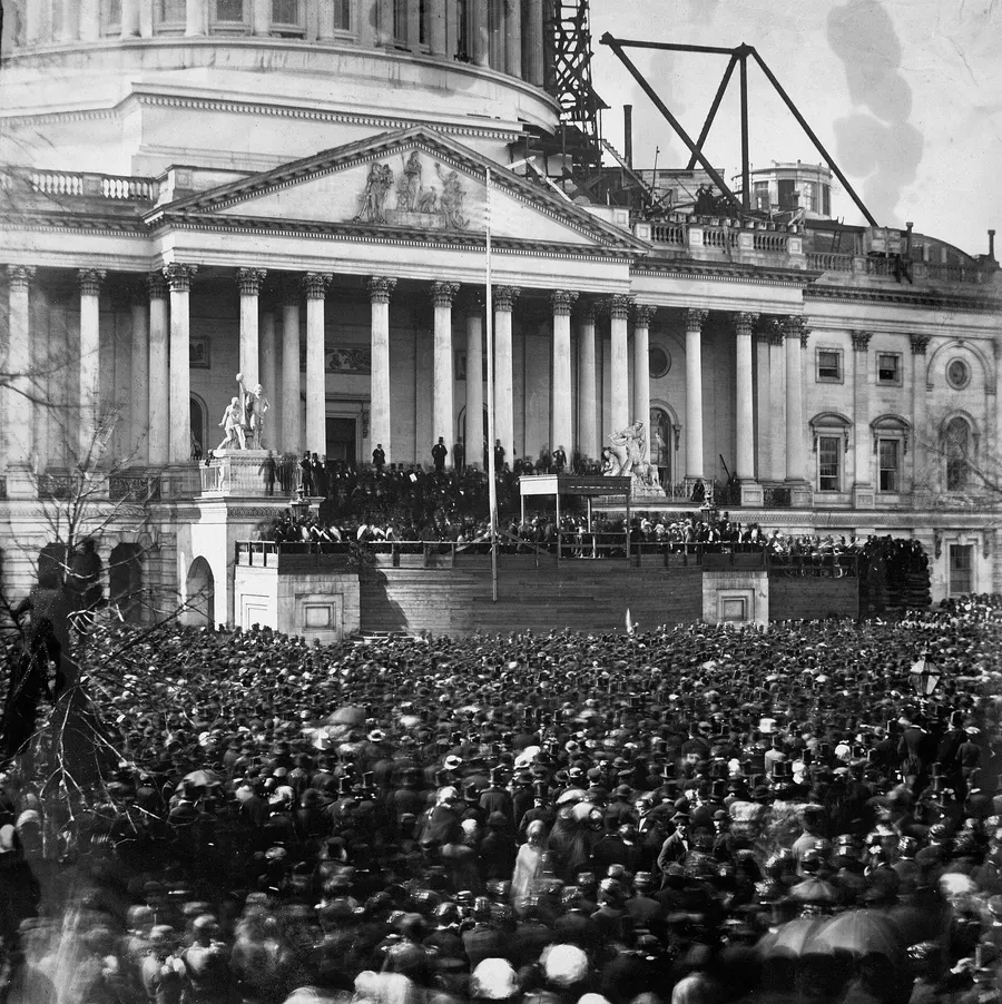 Crowds at Lincoln's first inauguration before the Capitol, its new dome still under construction, 4 March 1861.