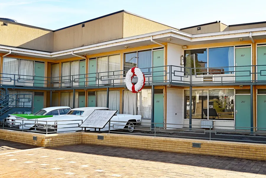The Lorraine Motel in Memphis, now part of the National Civil Rights Museum; a wreath marks the balcony outside Room 306, 2022.