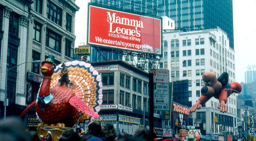 The Macy's Thanksgiving Day Parade on Broadway in 1979, with the Tom Turkey float and an Underdog balloon.