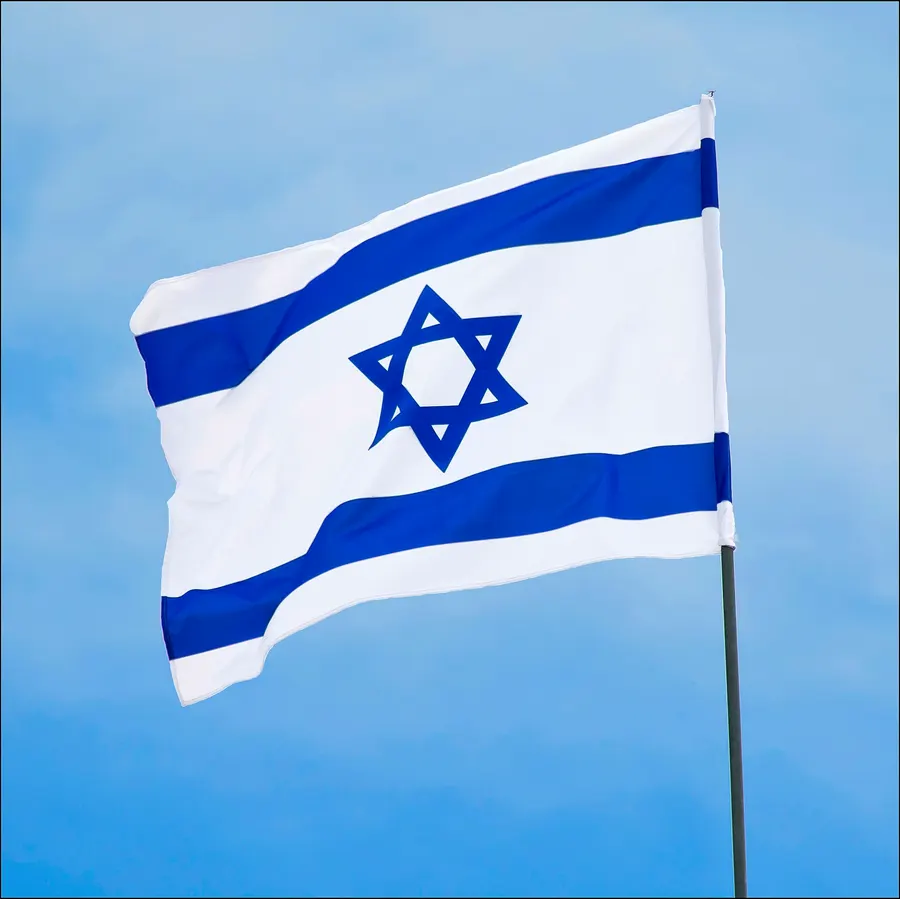 The flag of Israel flying against the sky