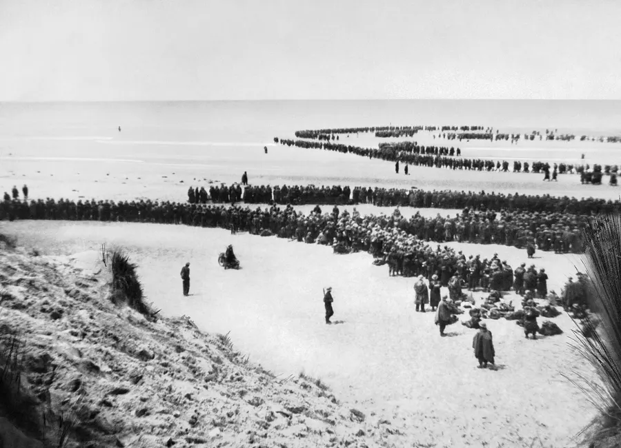 British troops lining up on the beach at Dunkirk to wait for evacuation, late May 1940