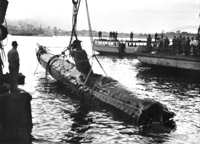 A Japanese midget submarine being raised from the bed of Sydney Harbour on 1 June 1942, the day after the raid
