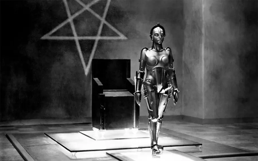 The robot Maschinenmensch in a scene from Metropolis, photographed on set by Horst von Harbou.