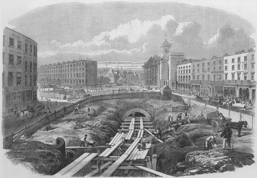Building the Metropolitan Railway near King's Cross: the open trench and part-finished cut-and-cover tunnel, in an 1861 illustration by Percy William Justyne.