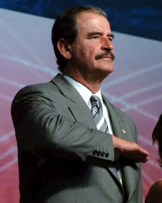 President Vicente Fox gives the civil salute to the flag, 2005.