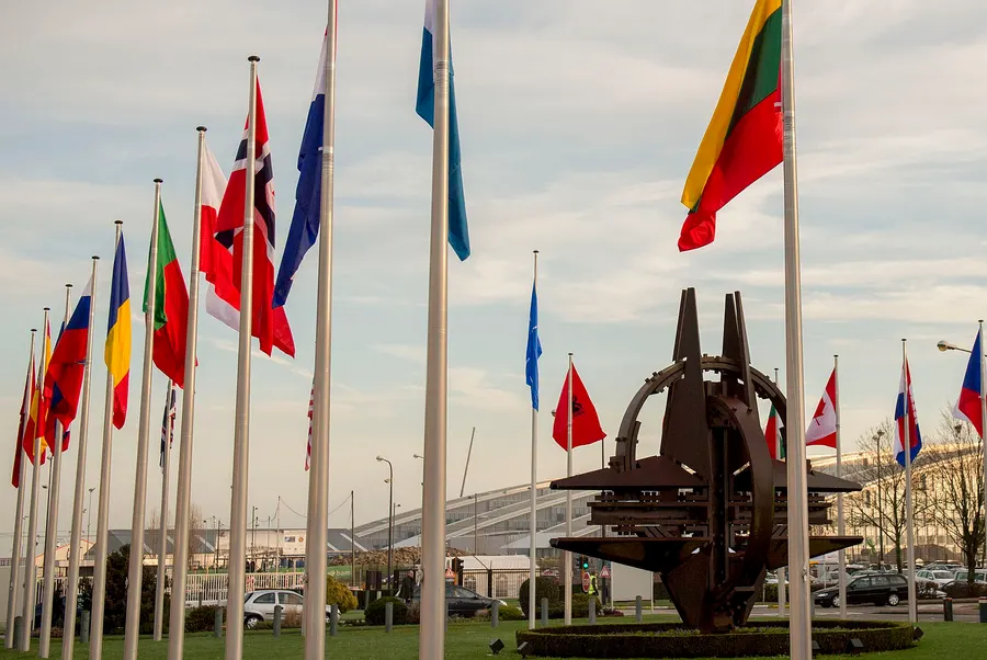 Member countries' flags at the entrance of NATO headquarters in Brussels, 2016.
