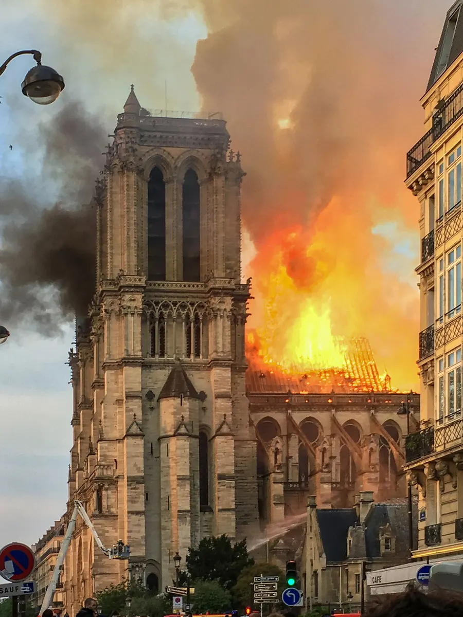 Fire in the roof of Notre-Dame, seen from Square René-Viviani at 7.51 pm on 15 April 2019.