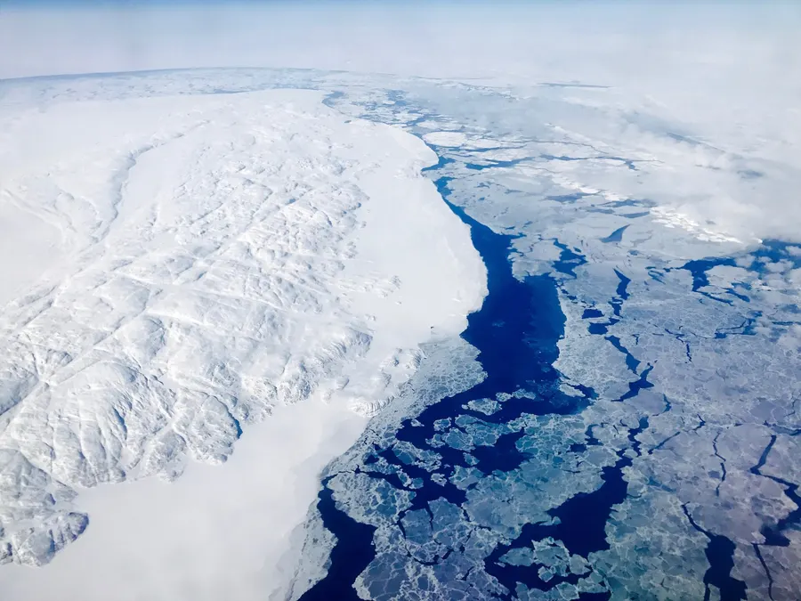 Sea ice and snow-covered land in Nunavut near Roes Welcome Sound, April 2017.