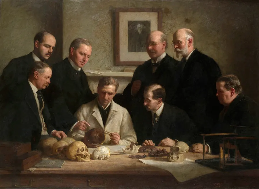 John Cooke's 1915 painting of scientists examining the Piltdown skull; Charles Dawson and Arthur Smith Woodward stand at the back.