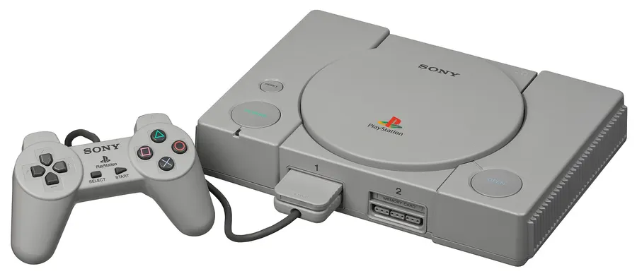 A Japanese SCPH-1000 PlayStation, the first model, with its controller and memory card.