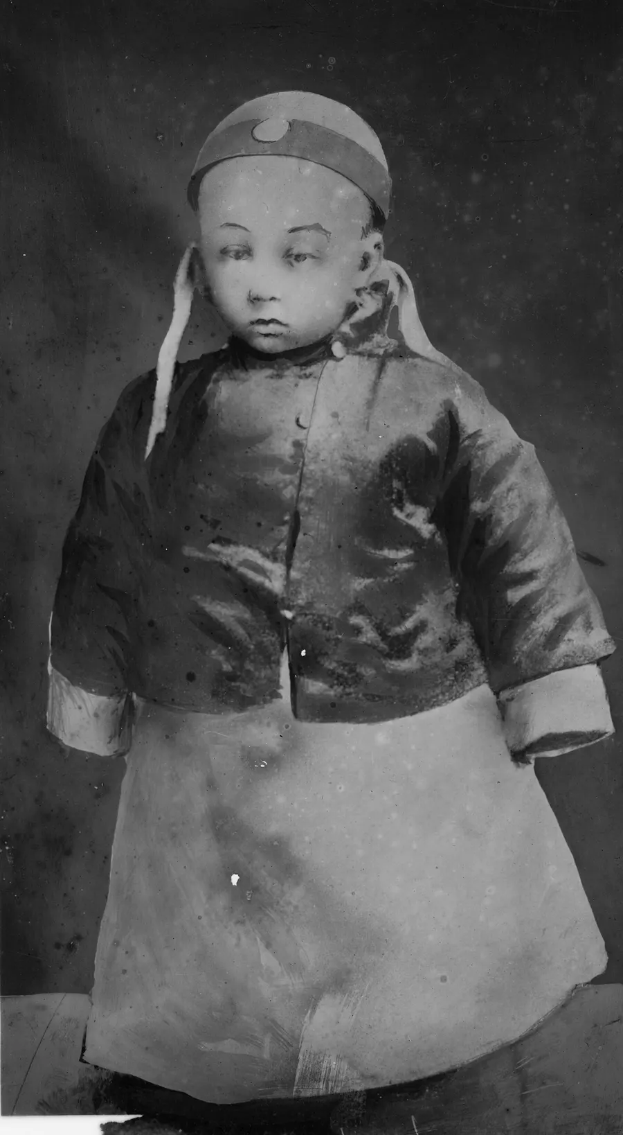 Puyi, the Xuantong Emperor, as a small child, in a Bain News Service photograph (Library of Congress).