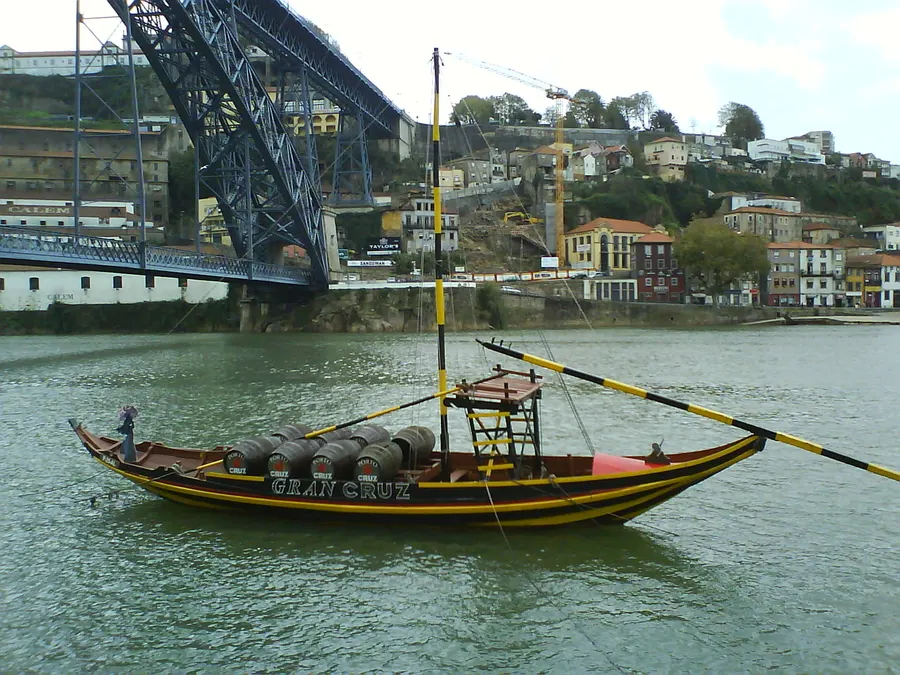 A rabelo boat carrying barrels of port on the Douro at Porto.