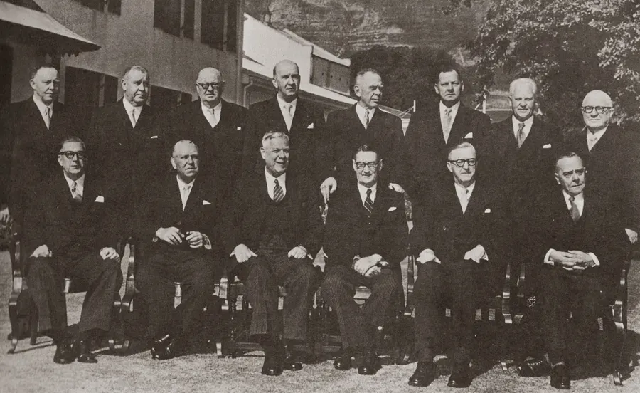 The South African cabinet in 1958; Hendrik Verwoerd sits third from left in the front row.