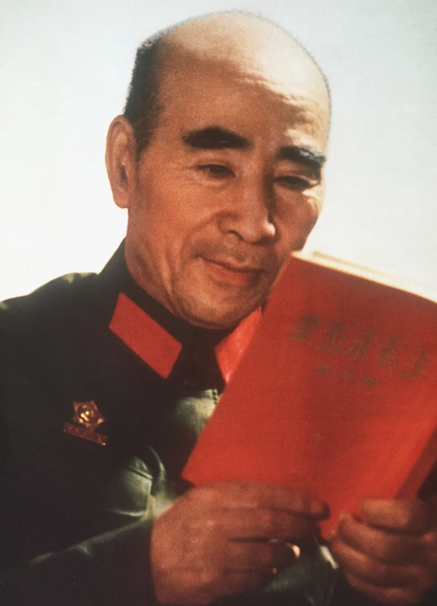 Lin Biao reading a copy of Mao Zedong's 'Little Red Book' in Beijing in 1971