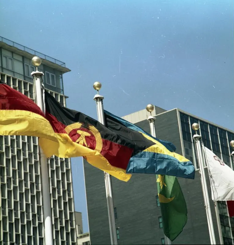 The flags of East and West Germany flying side by side outside the United Nations headquarters in New York in September 1973